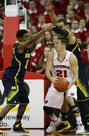 Derrick Walton Jr. (10) and Jordan Morgan (52)