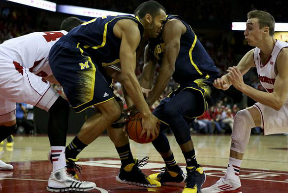 Jon Horford (15) and Glenn Robinson III (1)