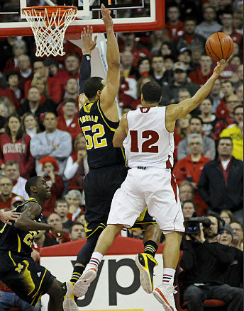 Caris LeVert (23) and Jordan Morgan (52)