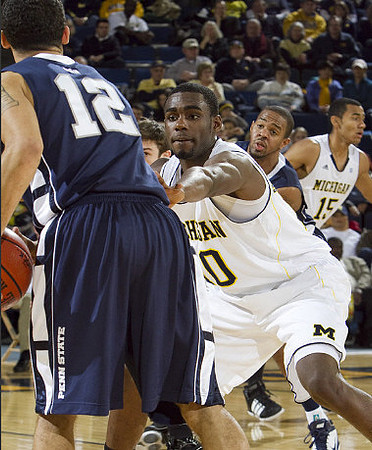 Tim Hardaway Jr. (10), Stu Douglass (1), and Jon Horford (15)