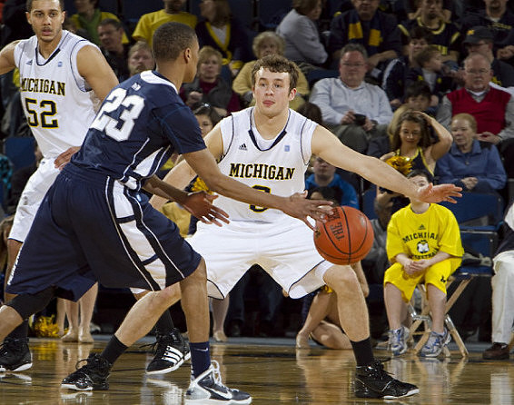 Jordan Morgan (52) and Zack Novak (0)