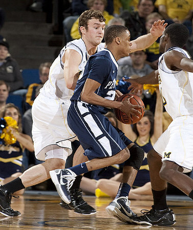 Zack Novak (0) and Tim Hardaway Jr. (10)