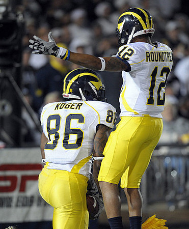 Kevin Koger (86) and Roy Roundtree (12)