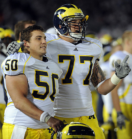 David Molk (50) and Taylor Lewan (77)