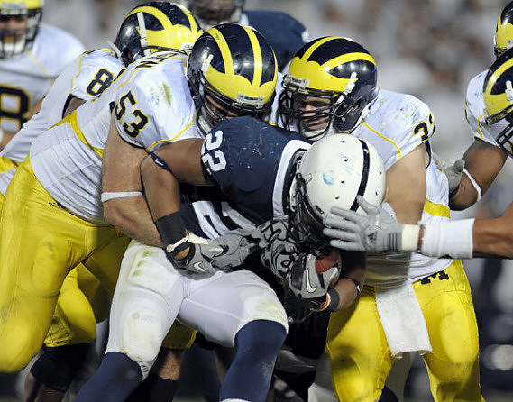 Jonas Mouton (8), Ryan Van Bergen (53), and Jordan Kovacs (32)