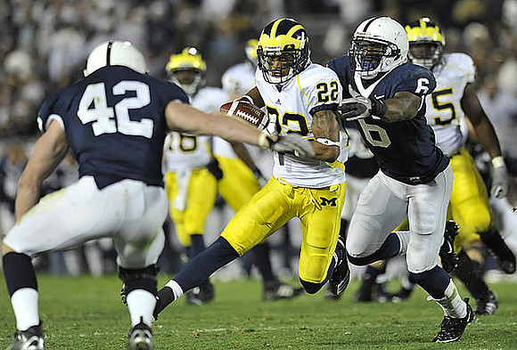 Denard Robinson (16), Darryl Stonum (22), and Patrick Omameh (65)