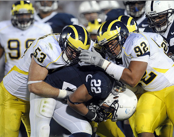 Adam Patterson (99), Ryan Van Bergen (53), Greg Banks (92), and Kenny Demens (25)