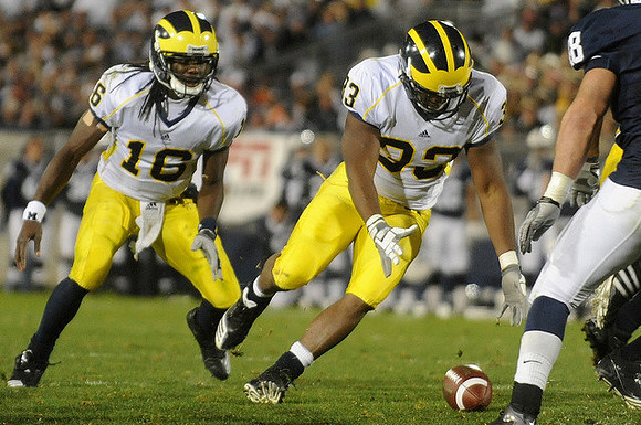 Denard Robinson (16) and Stephen Hopkins (33)