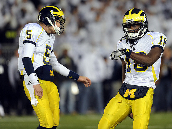 Tate Forcier (5) and Denard Robinson (16)