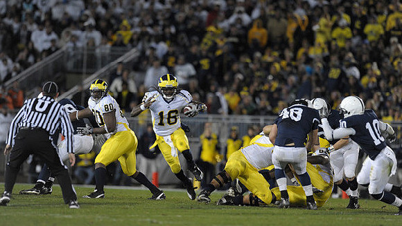 Martell Webb (80) and Denard Robinson (16)
