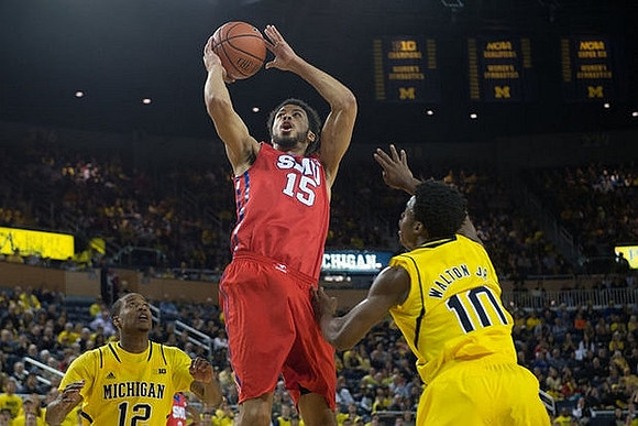 Muhammad-Ali Abdur-Rahkman (12) and Derrick Walton Jr. (10)
