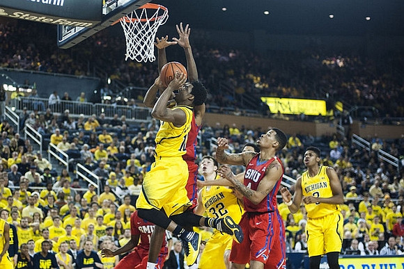 Derrick Walton Jr. (10), Ricky Doyle (32), and Spike Albrecht (2)