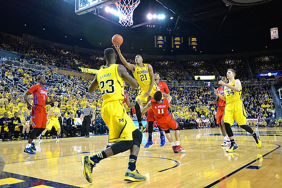 Caris LeVert (23), Zak Irvin (21), Mark Donnal (34), and Spike Albrecht (2)