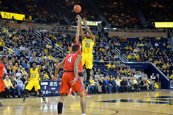 Caris LeVert (23) and Zak Irvin (21)