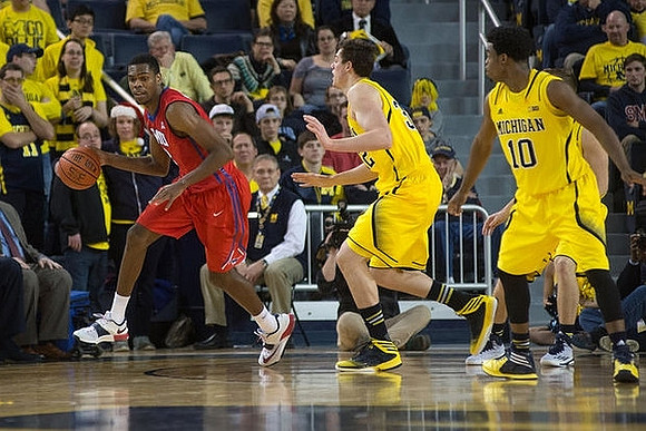 Ricky Doyle (32) and Derrick Walton Jr. (10)