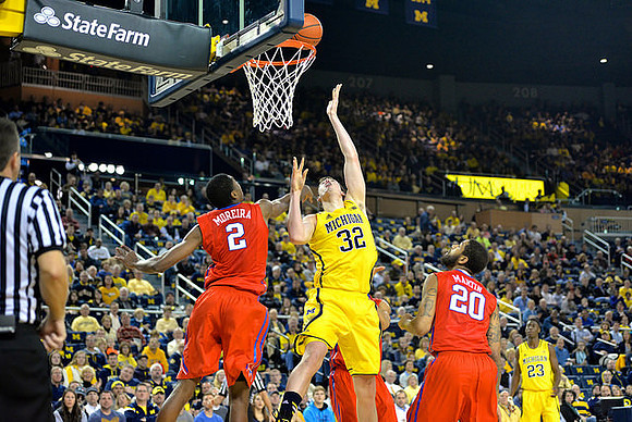 Ricky Doyle (32) and Caris LeVert (23)