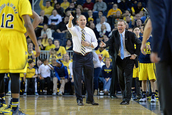Muhammad-Ali Abdur-Rahkman (12), John Beilein, and Jeff Meyer