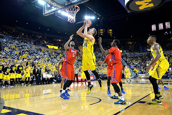 Mark Donnal (34) and Zak Irvin (21)