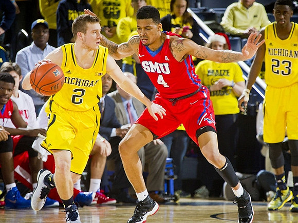 Spike Albrecht (2) and Caris LeVert (23)