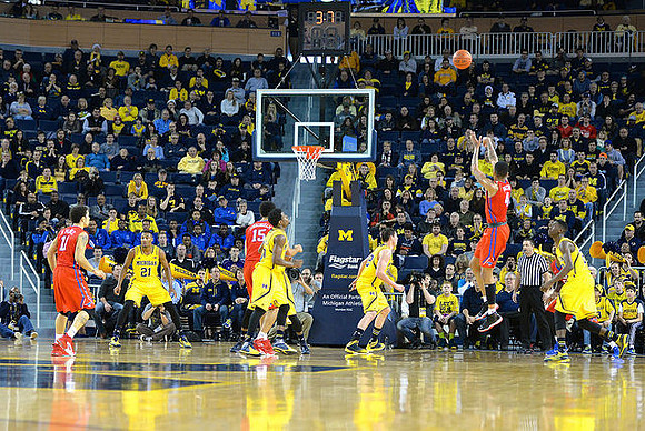 Zak Irvin (21), Derrick Walton Jr. (10), Ricky Doyle (32), and Caris LeVert (23)