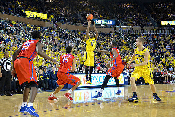 Derrick Walton Jr. (10) and Max Bielfeldt (44)
