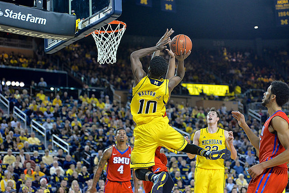 Derrick Walton Jr. (10) and Ricky Doyle (32)