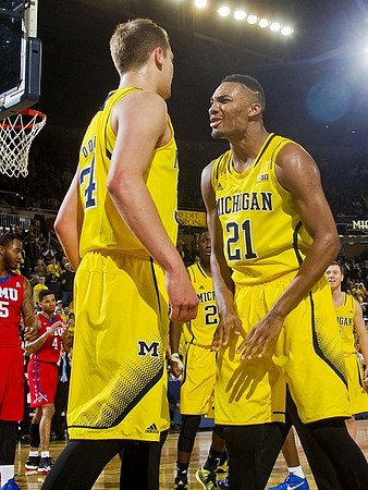 Mark Donnal (34), Zak Irvin (21), Caris LeVert (23), and Spike Albrecht (2)