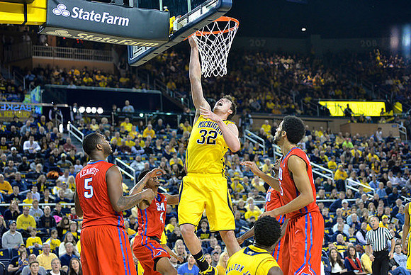 Ricky Doyle (32) and Derrick Walton Jr. (10)