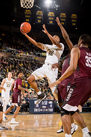 Duncan Robinson (22) and Muhammad-Ali Abdur-Rahkman (12)