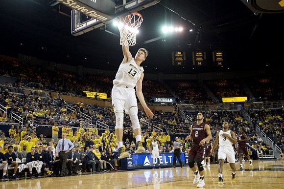 Moritz Wagner (13) and Xavier Simpson (3)