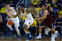 Duncan Robinson (22) and Derrick Walton Jr. (10)