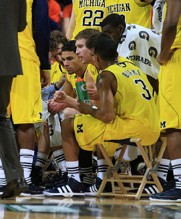Colton Christian (45), Evan Smotrycz (23), and Trey Burke (3)