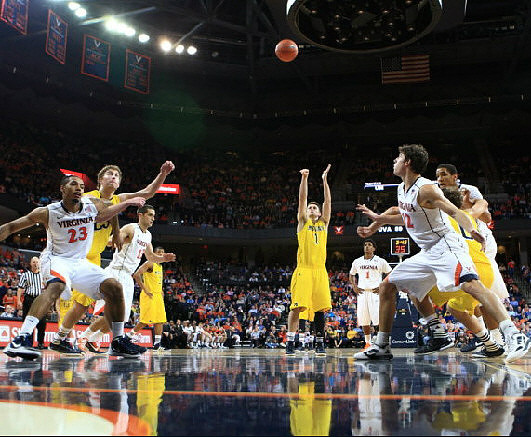 Evan Smotrycz (23), Trey Burke (3), Stu Douglass (1), and Zack Novak (0)