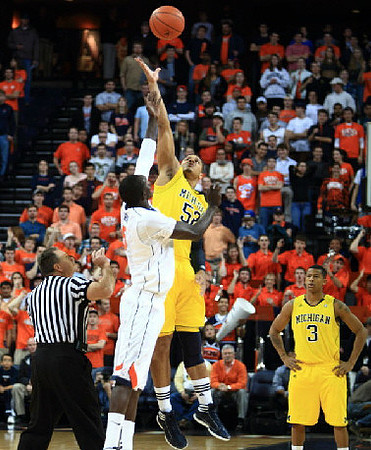 Jordan Morgan (52) and Trey Burke (3)
