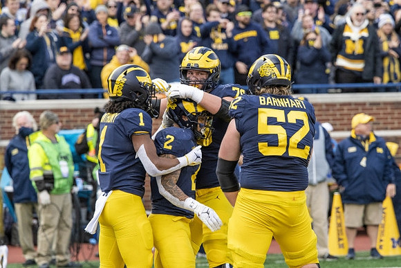 Andrel Anthony (1), Blake Corum (2), Peter Simmons (75), and Karsen Barnhart (52)