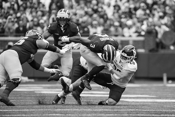 Ryan Hayes (76), Blake Corum (2), and A.J. Henning (3)