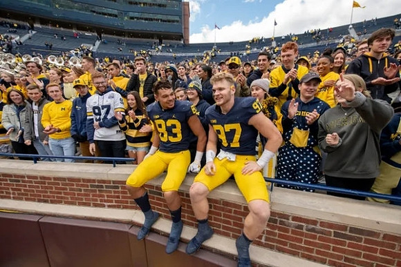 Erick All (83) and Aidan Hutchinson (97)