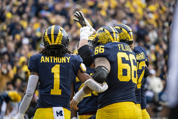 Andrel Anthony (1), Hassan Haskins (25), Chuck Filiaga (66), and Karsen Barnhart (52)