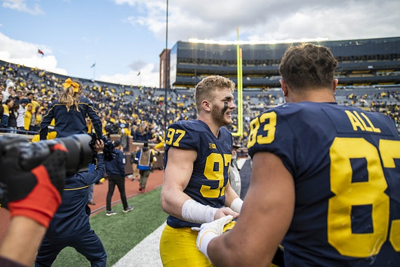 Aidan Hutchinson (97) and Erick All (83)