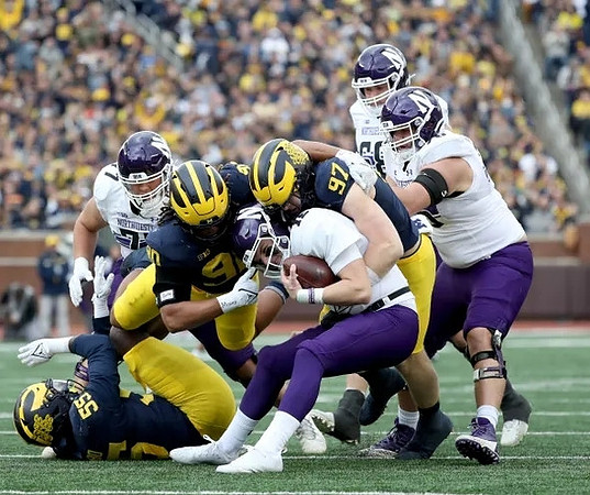 David Ojabo (55), Mike Morris (90), and Aidan Hutchinson (97)