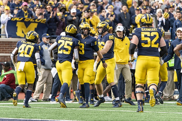 Leon Franklin (40), Hassan Haskins (25), J.J. McCarthy (9), Luke Schoonmaker (86), and Karsen Barnhart (52)