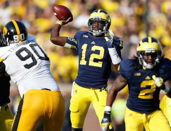 Devin Gardner (12) and Vincent Smith (2)