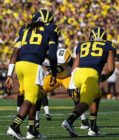 Denard Robinson (16) and Joe Reynolds (85)