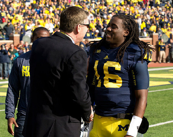 David Brandon and Denard Robinson (16)