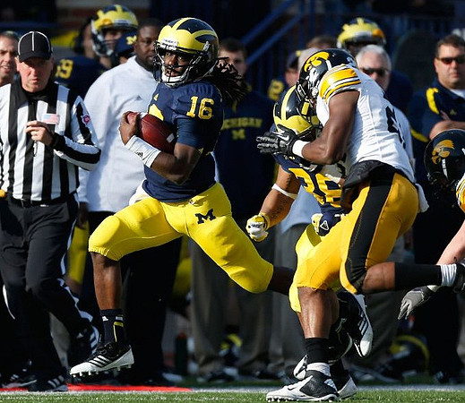 Denard Robinson (16) and Thomas Rawls (38)
