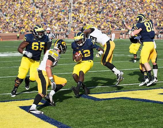 Patrick Omameh (65), Devin Gardner (12), and Mike Kwiatkowski (81)