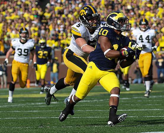 Jeremy Gallon (10) and Stephen Hopkins (33)