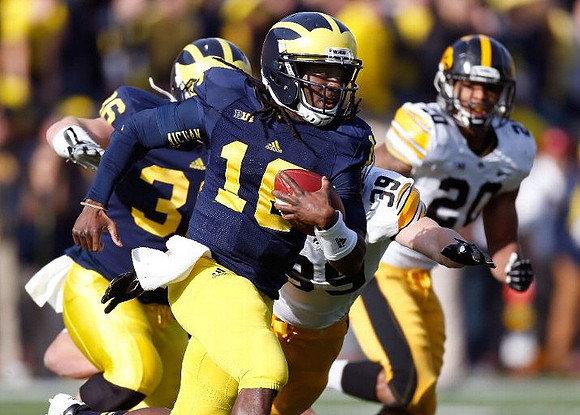 Joe Kerridge (36) and Denard Robinson (16)