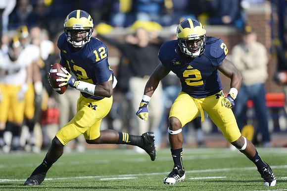 Devin Gardner (12) and Vincent Smith (2)