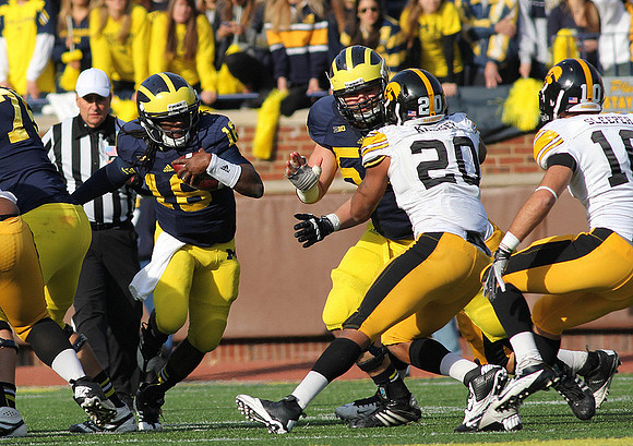 Michael Schofield (75), Denard Robinson (16), and Elliott Mealer (57)
